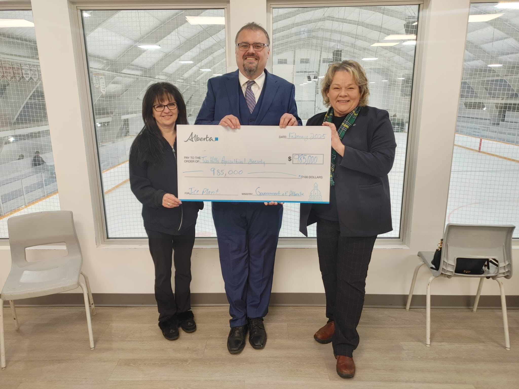 Presentation of a $985,000 CFEP grant cheque with MLA Jackie Armstrong-Homeniuk and the president of the Two Hills Agricultural Society.